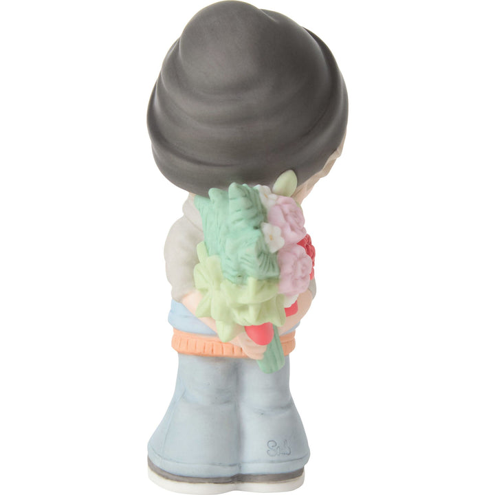 Boy Holding Flowers Figurine by Precious Moments
