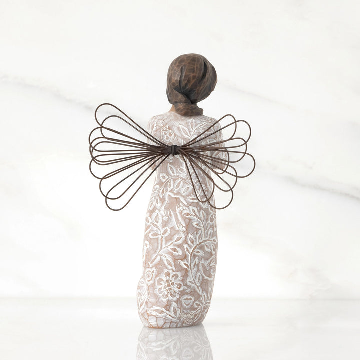 Remembrance Figurine (darker skin and hair) by Willow Tree