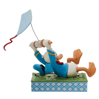 A Flying Duck (Donald Duck with a Kite Figurine) - Disney Traditions by Jim Shore