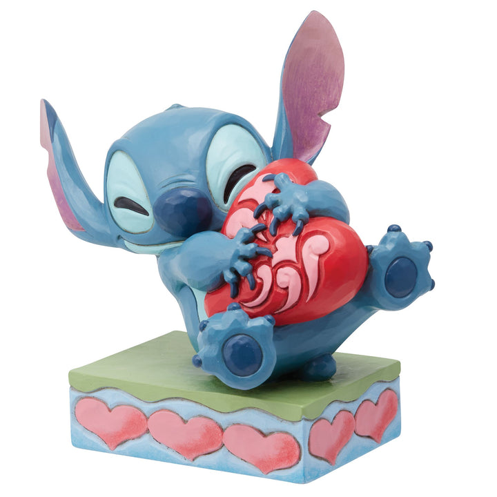 Heart Struck (Stitch Hugging a Heart Figurine) - Disney Traditions by Jim Shore