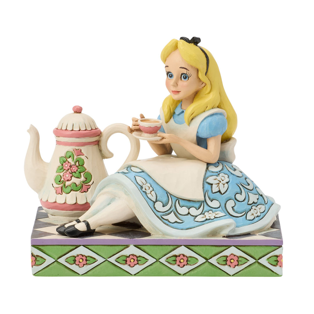 A Cup of Curiosity (Alice with Teapot Figurine)