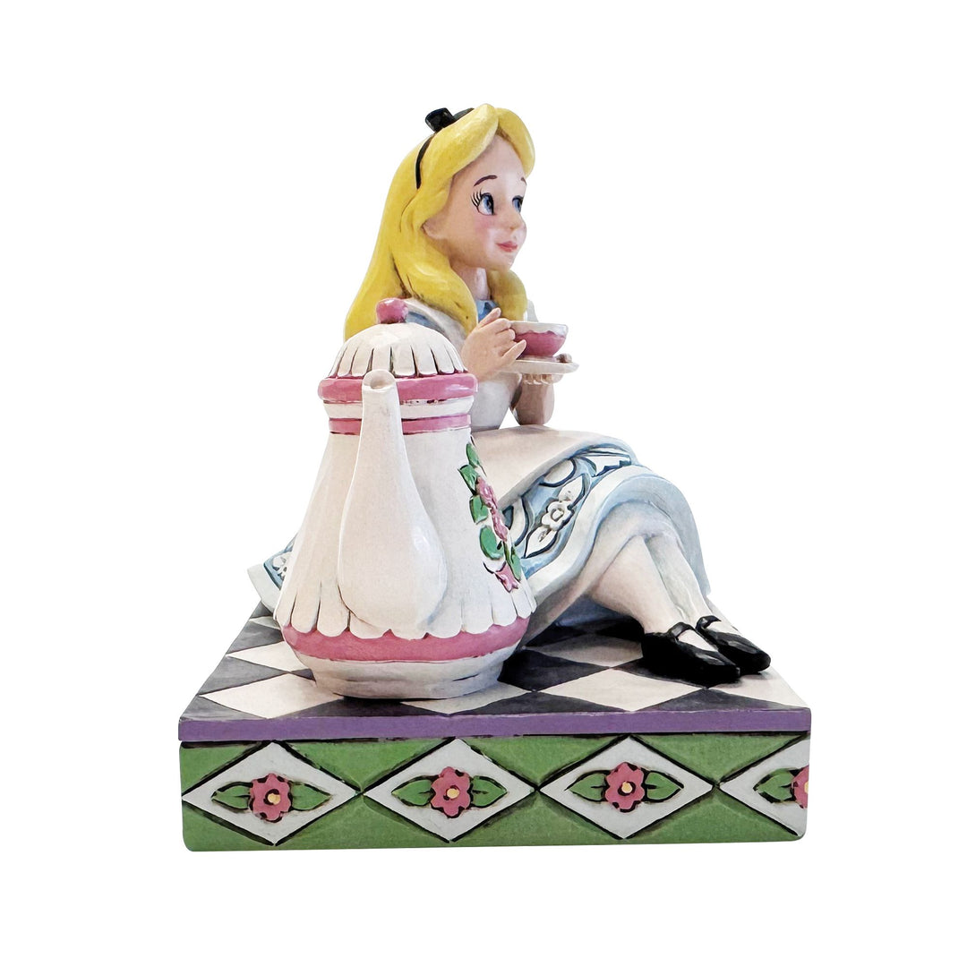 A Cup of Curiosity (Alice with Teapot Figurine)
