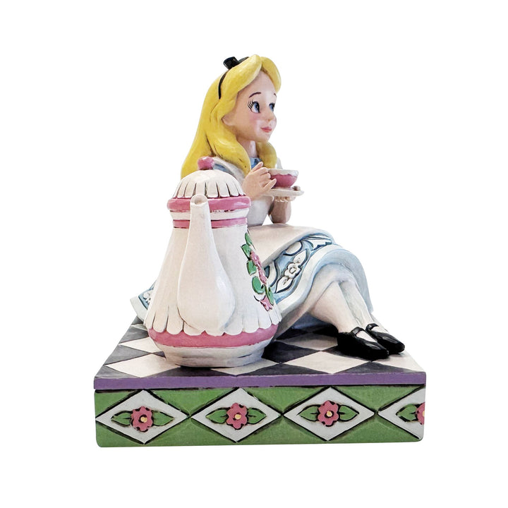 A Cup of Curiosity (Alice with Teapot Figurine)