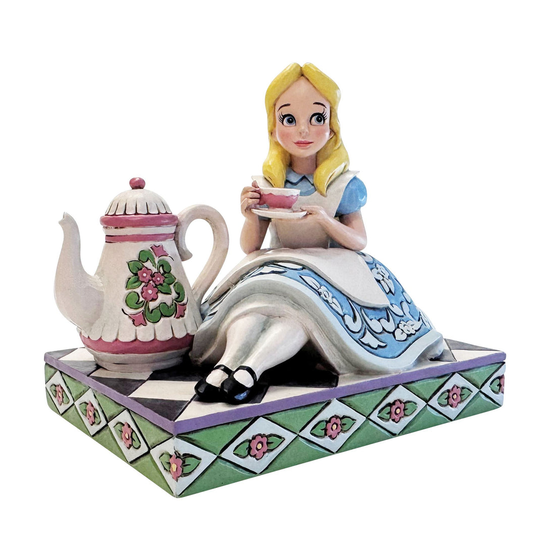 A Cup of Curiosity (Alice with Teapot Figurine)