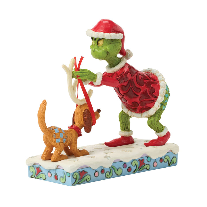 The Grinch Tying Antlers on Max Figurine