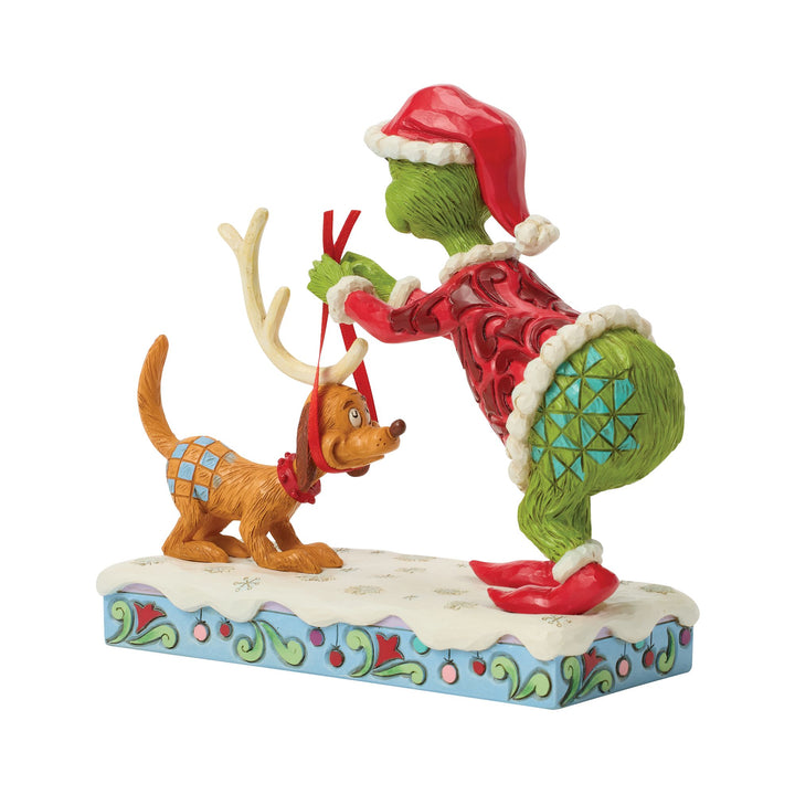 The Grinch Tying Antlers on Max Figurine