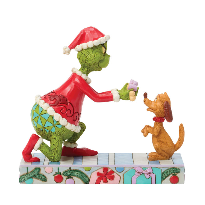 The Grinch Giving Max a Bone Figurine