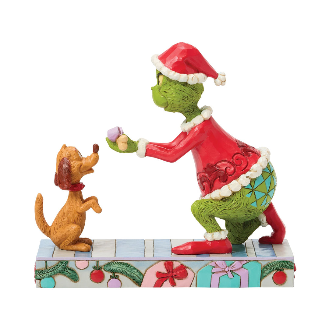 The Grinch Giving Max a Bone Figurine