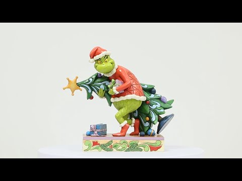 The Grinch Stealing a Tree Figurine